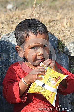 Child, person, yellow, boy, male, human, temple, toddler, eating, play, fun Editorial Stock Photo