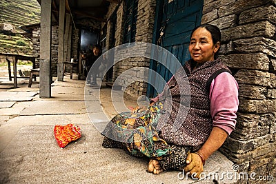 nepalese mother and child on the porch Editorial Stock Photo