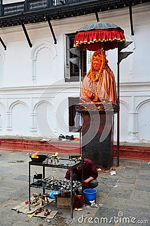 Nepalese people pray with Hanuman statue at Basantapur Durbar Square Editorial Stock Photo