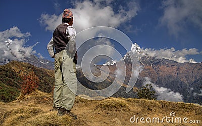 Nepali men and mount machapuchare Stock Photo