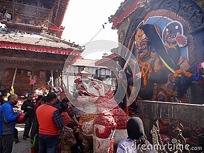 Nepali people travelers travel visit and respect praying offerings sacrifices Hindu goddess Kali or Kaal Bhairav or Kalika at Editorial Stock Photo