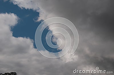 Atmospheric sky art image. White Cumulonimbus cloud in blue sky. Australia Stock Photo