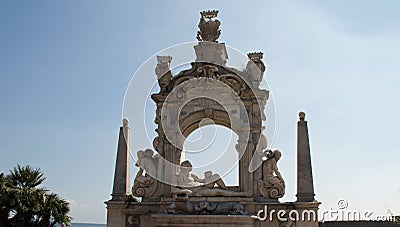 Neptune sculpture and arch Stock Photo