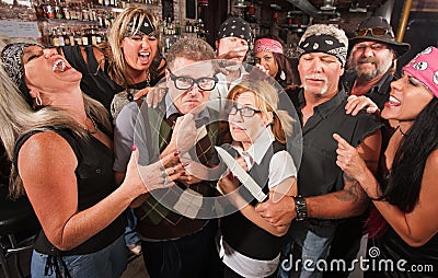 Nerd Couple Threatened by Gang Stock Photo