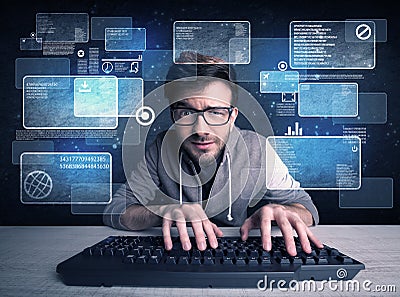 Nerd with glasses hacking websites Stock Photo