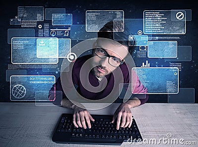 Nerd with glasses hacking websites Stock Photo