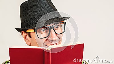 Nerd man reading book. Book lover Stock Photo