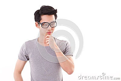 Nerd man thinking, studio shot, white background Stock Photo