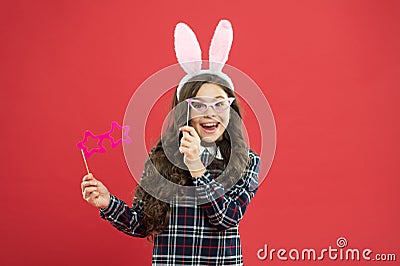 Nerd party. Traditional party activities. Booth props. Cheer up. Little cute bunny. Having fun. Schoolgirl bunny ears Stock Photo