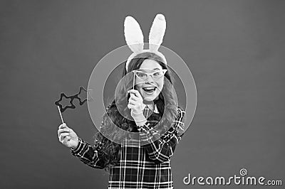 Nerd party. Traditional party activities. Booth props. Cheer up. Little cute bunny. Having fun. Schoolgirl bunny ears Stock Photo