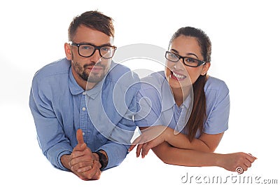 Nerdy looking couple looking at camera Stock Photo