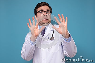 Nervous attractive man medical student afraids of something difficult Stock Photo
