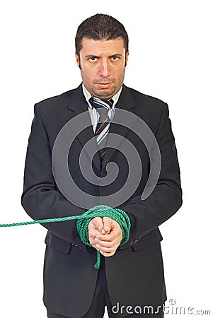 Nervous businessman with hands tied Stock Photo