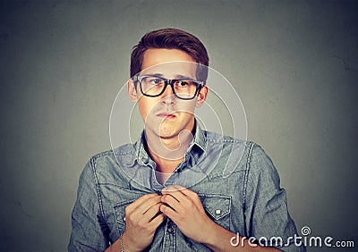 Nervous introvert man feels awkward Stock Photo