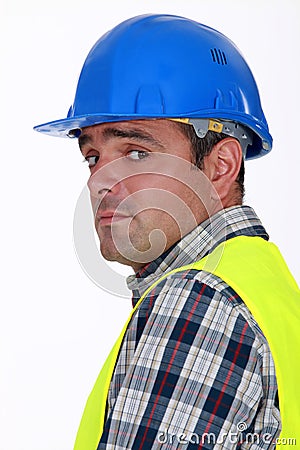 Nervous-looking tradesman Stock Photo