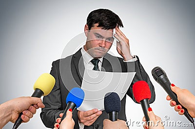 Nervous man is sweating, he afraid of public speech Stock Photo