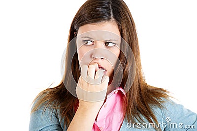 Nervous woman biting her nails craving for something or anxious Stock Photo