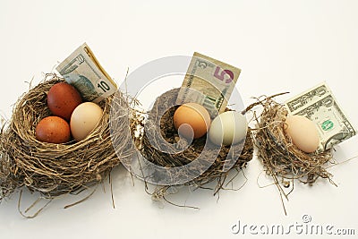 Decreasing Nests Eggs due to Inflation Stock Photo