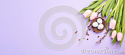 Nest with small eggs, pink tulips, easter holiday greeting card, spring season Stock Photo