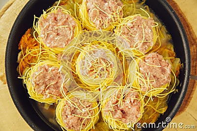Nest of spaghetti with meatballs Stock Photo
