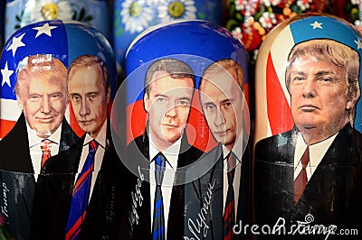 Nested dolls depicting Russian President Vladimir Putin and 45th US President Donald Trump on the counter of souvenirs. Editorial Stock Photo