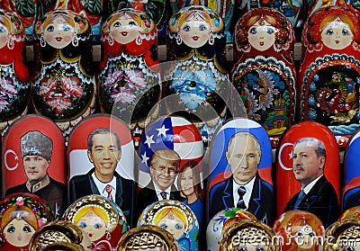 Nested dolls depicting world politicians Vladimir Putin, Donald Trump and Recep Erdogan on the counter of souvenirs in Moscow Editorial Stock Photo