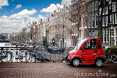 Amsterdam , holland ,Netherland , daylight , red car Editorial Stock Photo