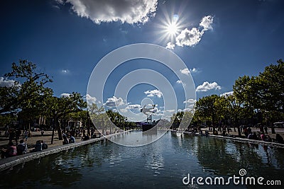 Amsterdam buildings park water sculpture Holland river Editorial Stock Photo