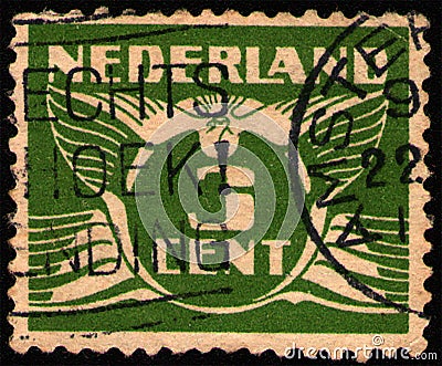 NETHERLANDS - CIRCA 1924: stamp shows stylized animal bird flying dove, value of 3 dutch cents Editorial Stock Photo