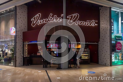 Dunkin' Donuts Neon sign, Dunkin' Donuts is an American global donut company Editorial Stock Photo