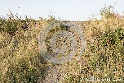 Dutch dikes are often made by using basalt blocks Stock Photo