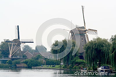 Historical wind mills aside river Vecht Editorial Stock Photo