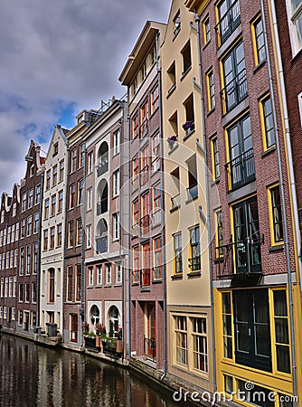 The Netherlands, Old Amsterdam houses on water Stock Photo