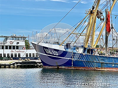 Docked fishing boat UK33 in the port of Urk. Editorial Stock Photo