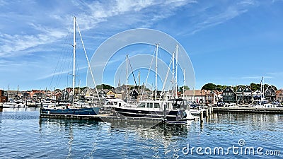 Docked fishing boats and sailboats in the port of Urk. Editorial Stock Photo