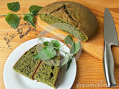 Nettles green round bread, weed dough Stock Photo