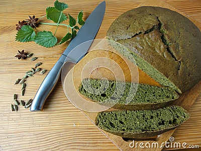 Nettles green round bread, weed dough Stock Photo