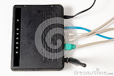 Network cable connects to wireless router router internet global network Stock Photo