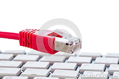 Network cable on keyboard Stock Photo