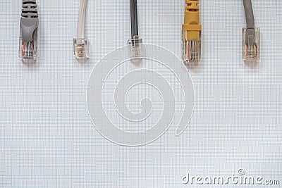 Network cables for connection on a millimeter background Stock Photo