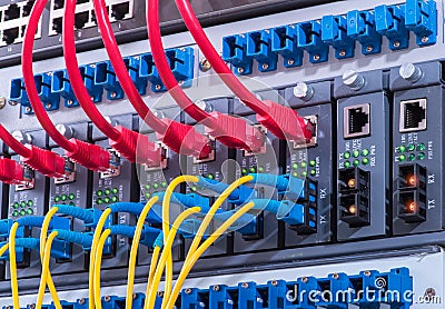 Network cables and hub closeup with fiber optical Stock Photo