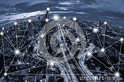 Network conection concept on blue tone Aerial view of cityscape Stock Photo