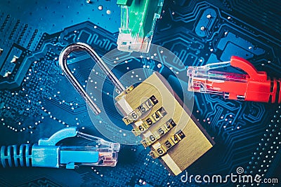 Network ethernet cables near opened padlock on computer motherboard. Internet data privacy information security concept. Blue tone Stock Photo