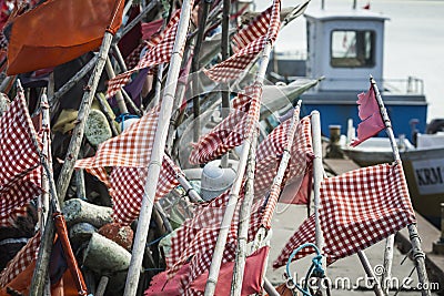 Network fishing drying on the beach in sunny day. Baltic Sea and Stock Photo