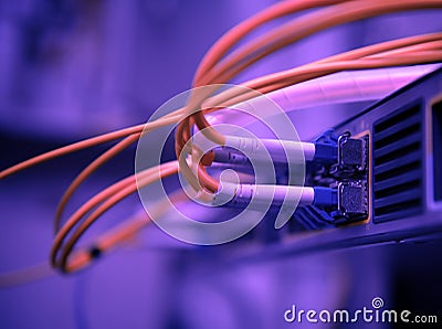 Network optical fiber cables and hub Stock Photo