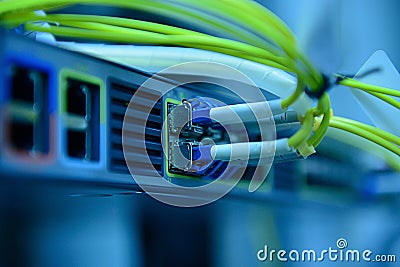 Network optical fiber cables and hub Stock Photo