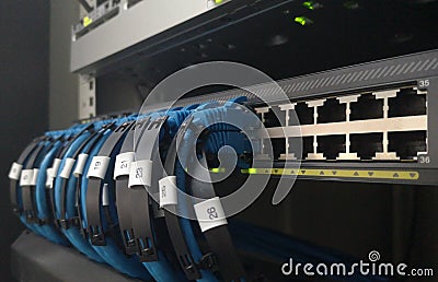 Network switch and ethernet cable connect to computer Stock Photo