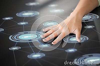 Hand using interactive panel with network icons Stock Photo