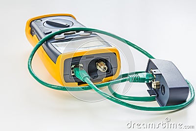 Network tester with green RJ45 cable 5e connected Stock Photo