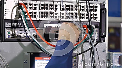 Networking service. network engineer administrator checking server hardware equipment of data center Editorial Stock Photo
